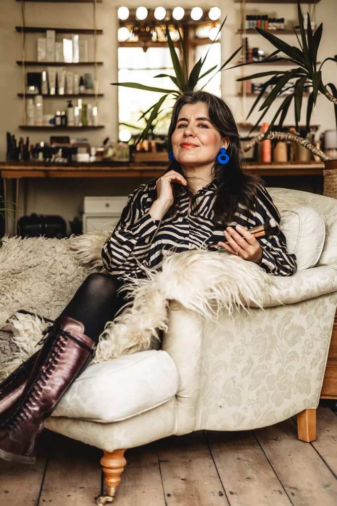 Midlife woman embracing self-worth and personal power.